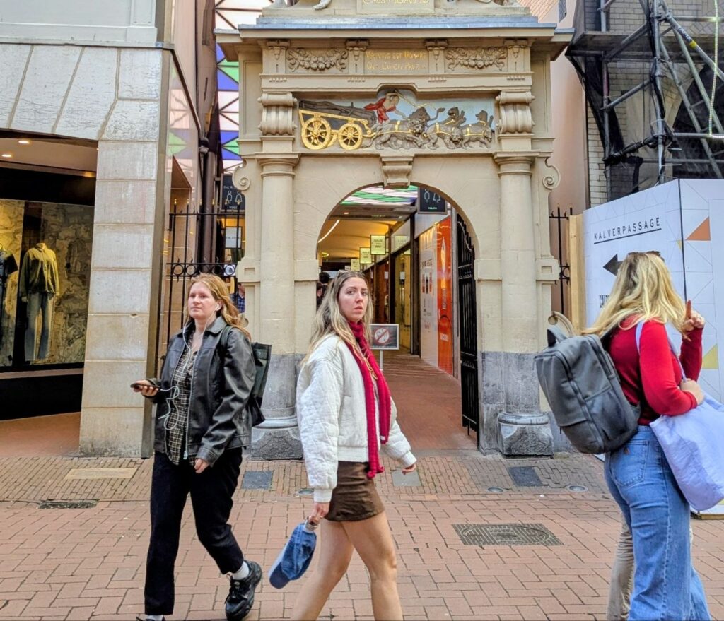 Young women travelling alone and exploring a European city during a solo travel trip