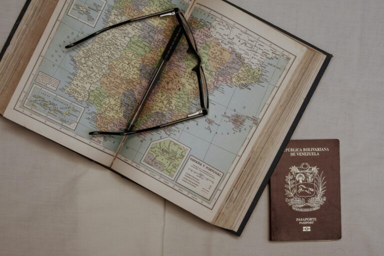 Digital nomad visa concept with passport, travel map, and remote work lifestyle planning