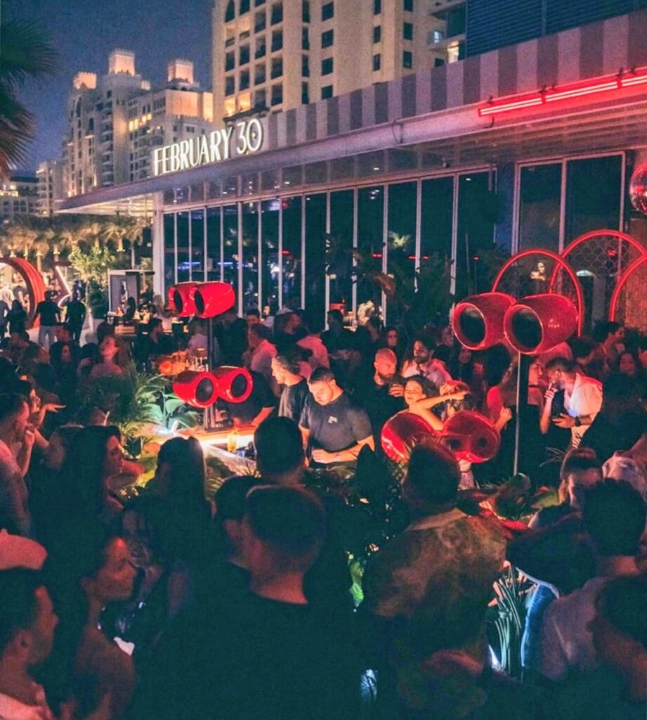 Crowded nightlife atmosphere at February 30 beach club in Dubai