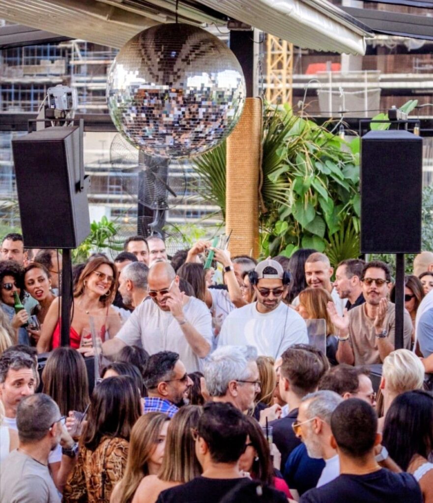 People socialising during a party at Canary Club in JLT Dubai