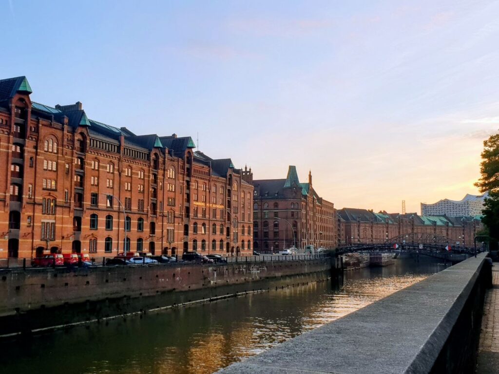Historic canal and warehouse buildings in Hamburg during an evening walk through the city