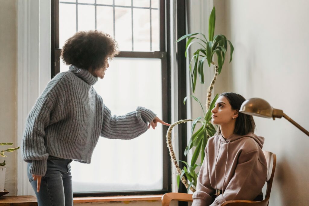 Toxic friendship argument between two women showing emotional tension and criticism in a close relationship