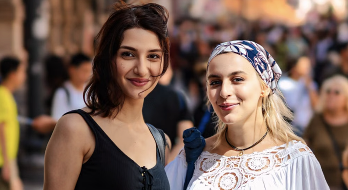 Two young women in Beirut illustrating the diverse Mediterranean appearance found among Lebanese people.