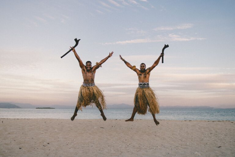 Traditional cultural performance on a beach in Vanuatu, highlighting local culture and everyday life for digital nomads and expats.