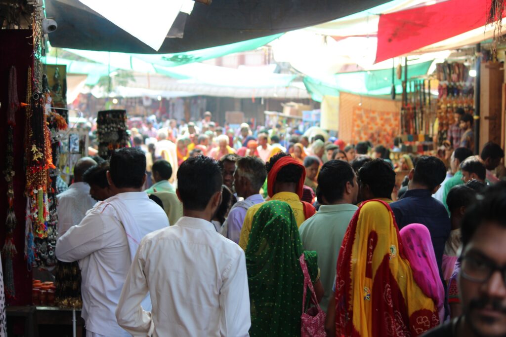 Crowded street market in India showing everyday urban life and local shoppers