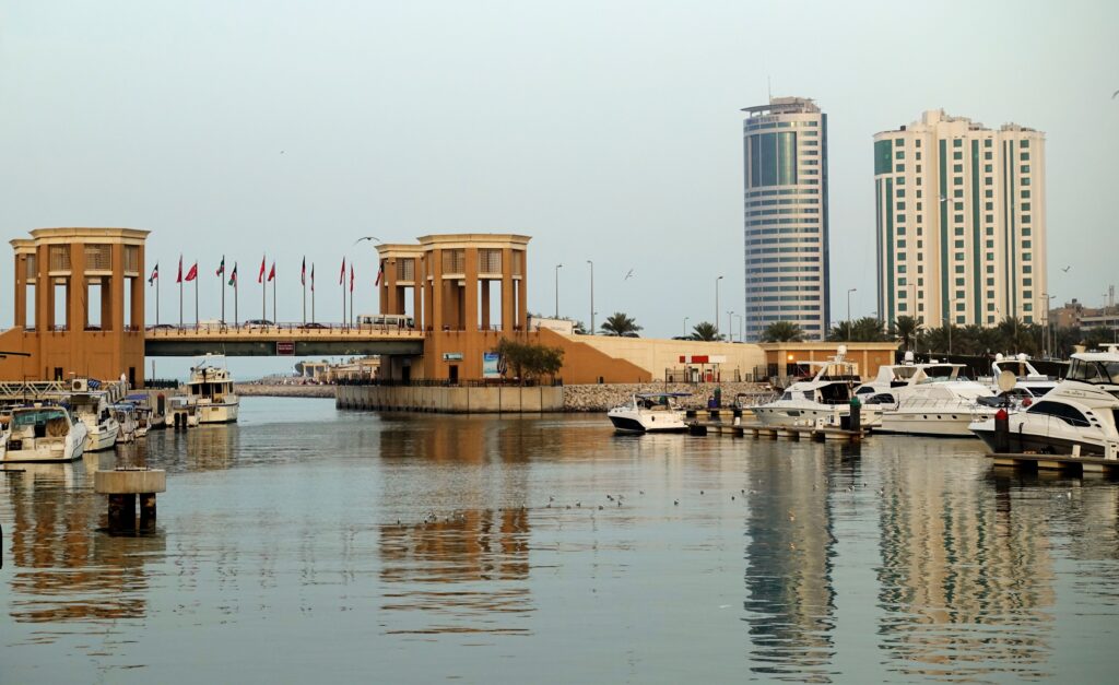 Manama waterfront with Bahrain Financial Harbour and marina, a modern Gulf city attracting remote workers and entrepreneurs.