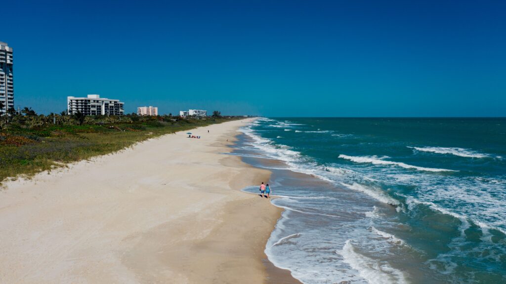 Aerial view of Juno Beach, Florida, with white sand and turquoise Atlantic Ocean