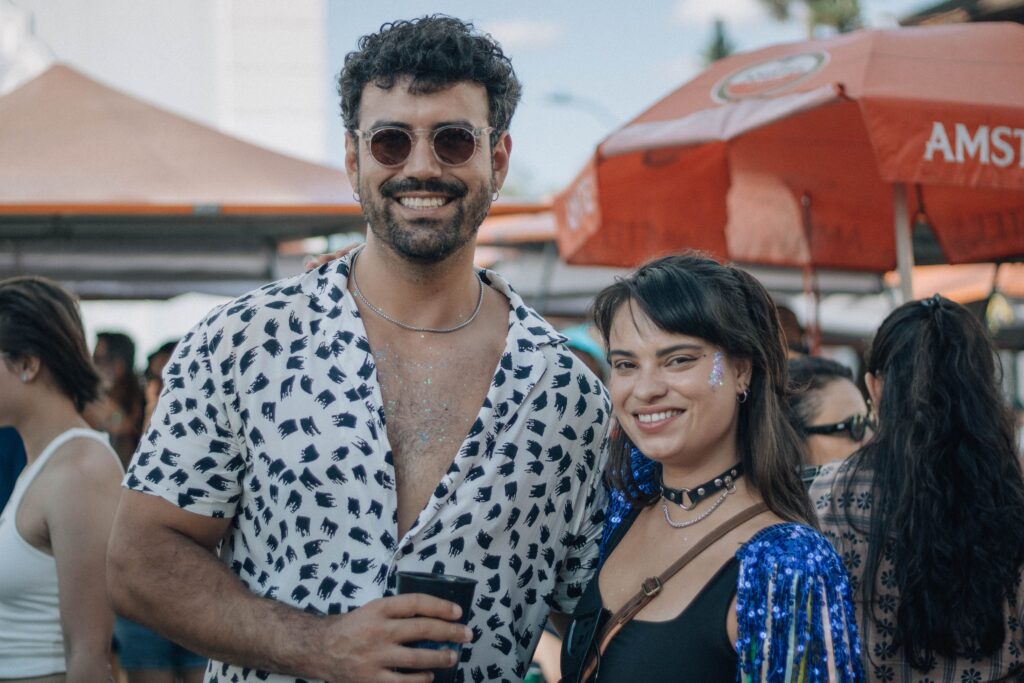 Young Lebanese man and woman at an outdoor event in Beirut reflecting the country's diverse Mediterranean appearance.