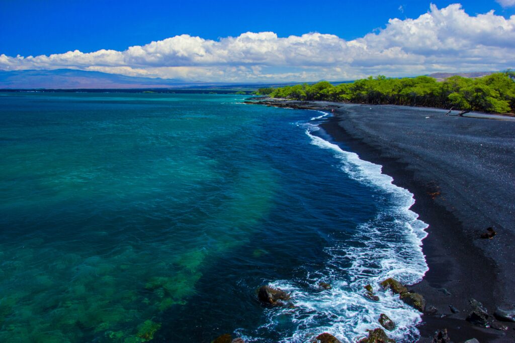 Hāpuna Beach on the Big Island of Hawaii with turquoise water and volcanic coastline