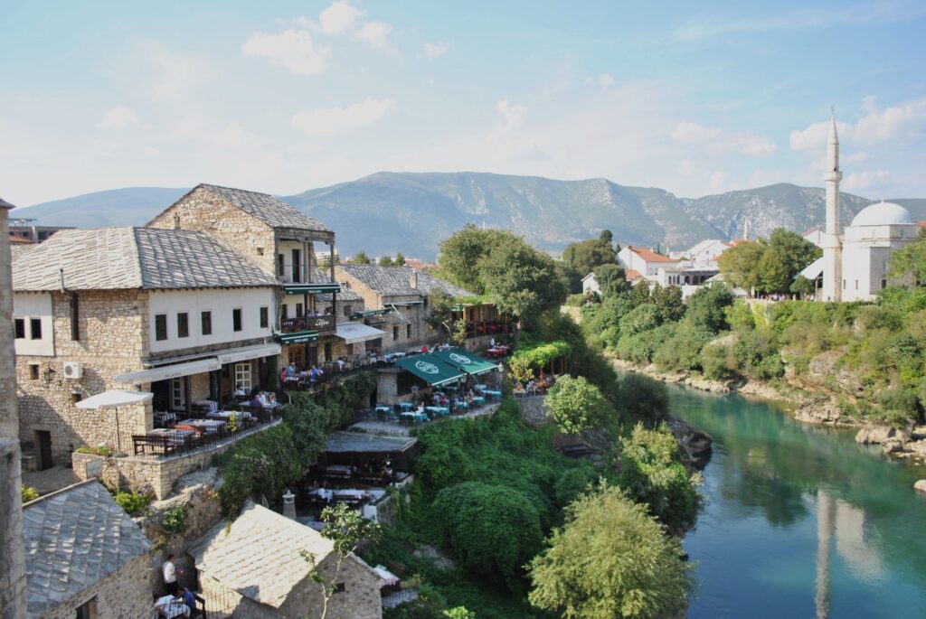Mostar Old Bridge area in Bosnia and Herzegovina, one of the most affordable Balkan cities for digital nomads.