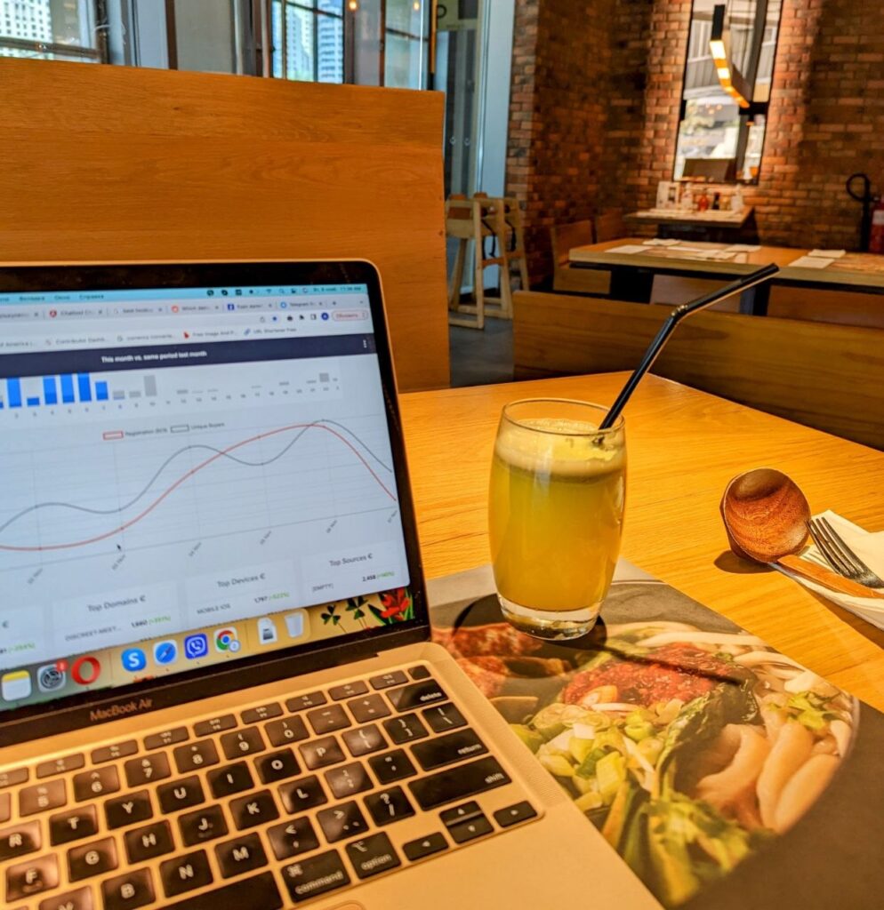 Remote work setup at one of the best coworking spaces in Dubai with a laptop, Wi-Fi and workspace for digital nomads