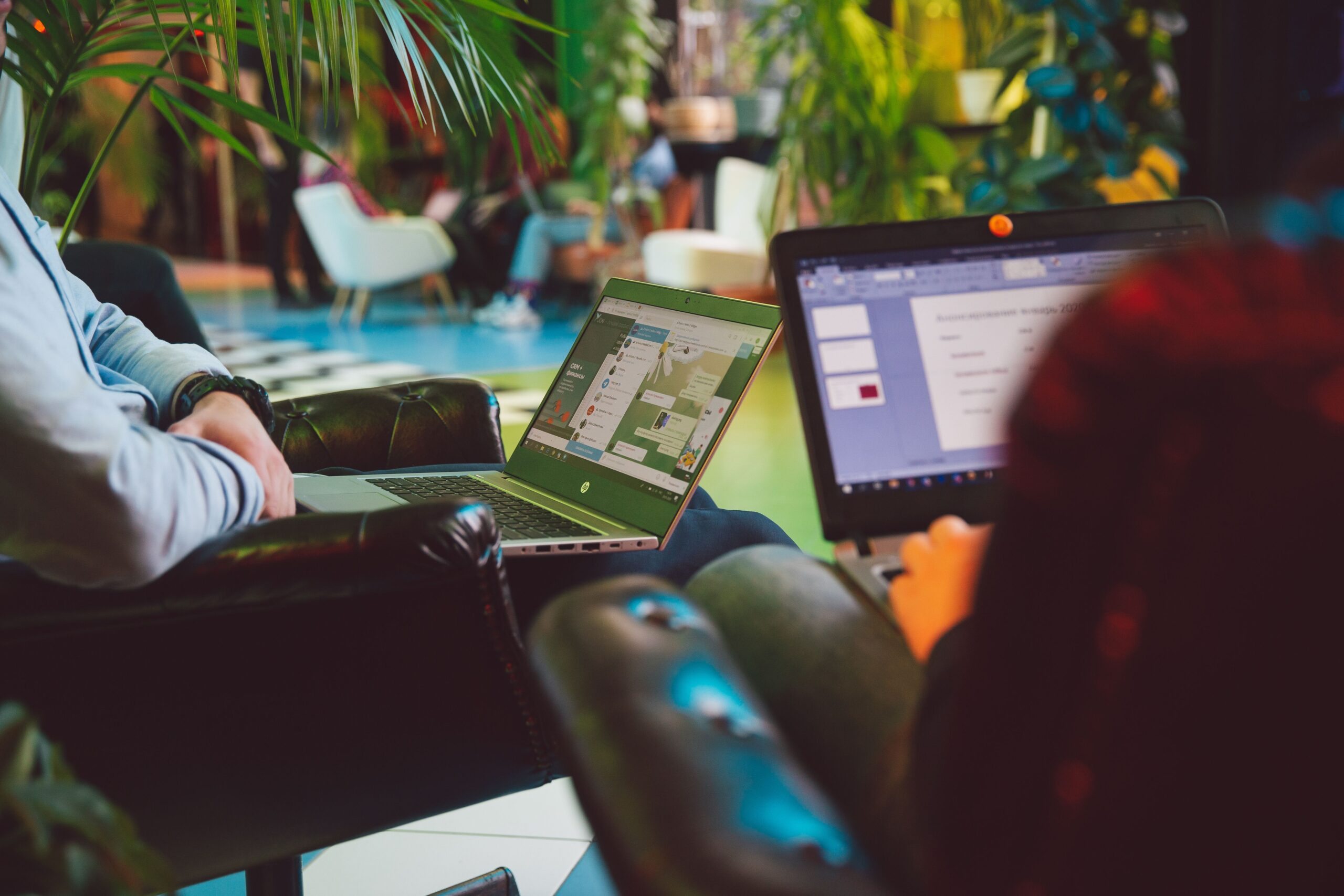 Remote worker using a laptop in a modern workspace