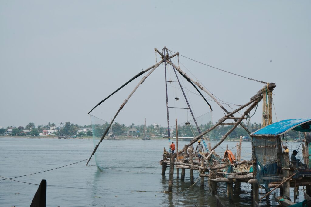 Traditional Chinese fishing nets along the waterfront in Kochi, Kerala, India.
