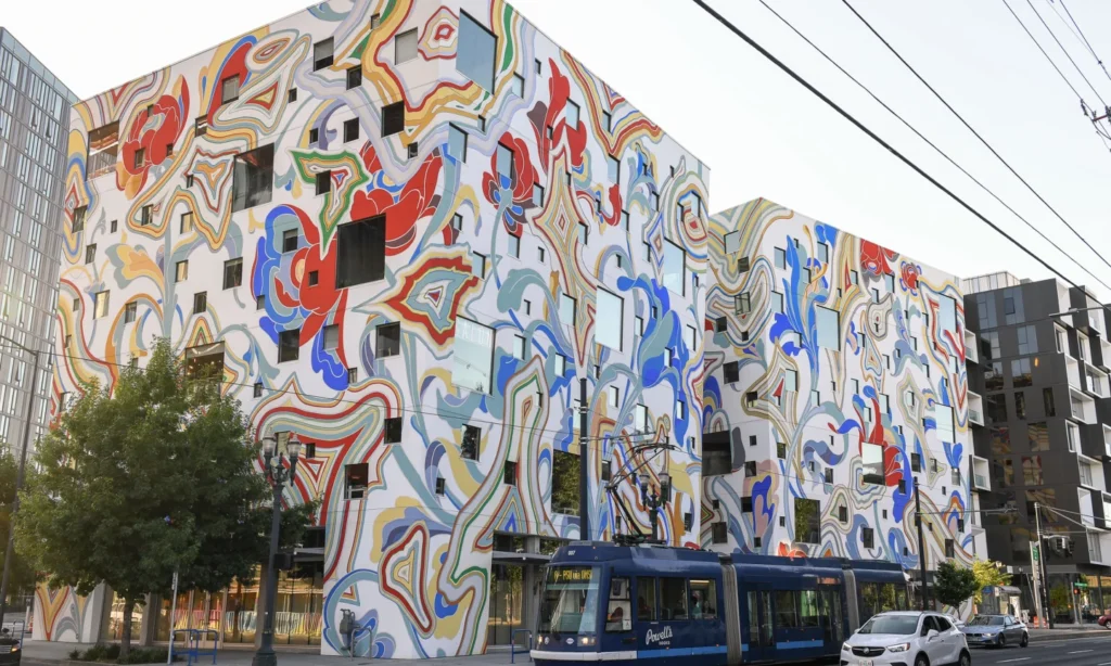 Colorful mural and streetcar in Central Eastside Portland, Oregon