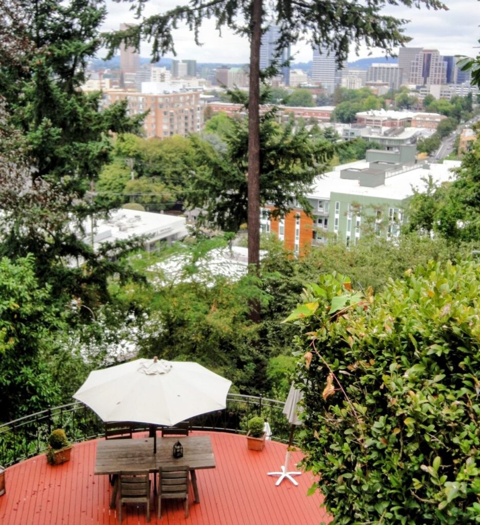 View of downtown Portland, Oregon surrounded by trees and greenery
